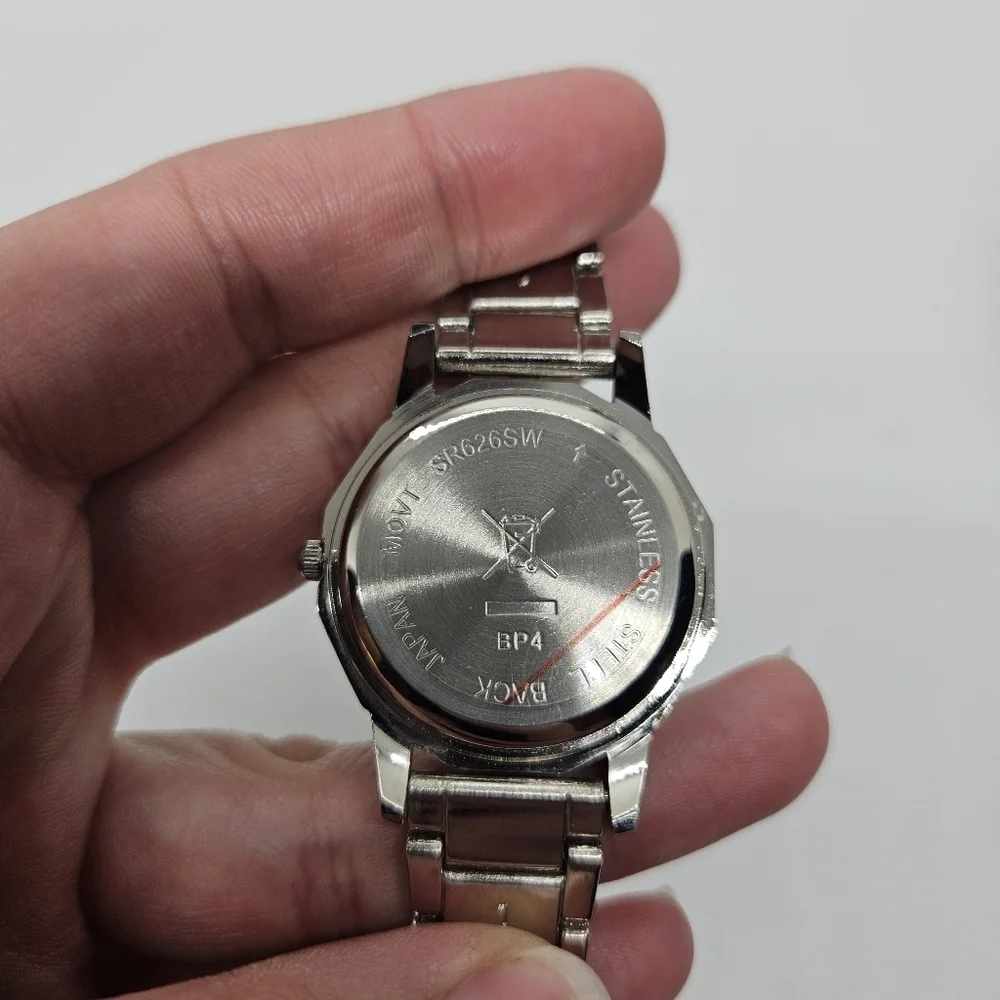 silver tone watch with rhinestone digits